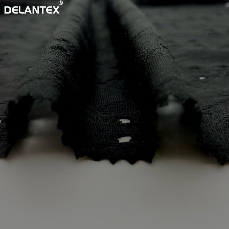 Delantex Fashion Polyester Jacquard Stretch Knit Garment Plain Dyed Hole Jacquard Dress Fabric Free Sample