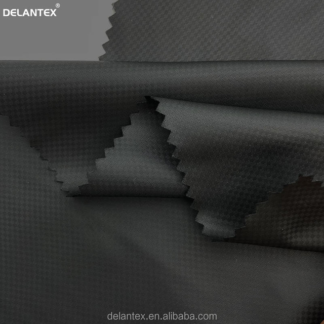 Delantex High Quality Softshell Lining Fabric Black Lightweight Long Filament Invisible Grid Jacquard for Outdoor Use for Girls