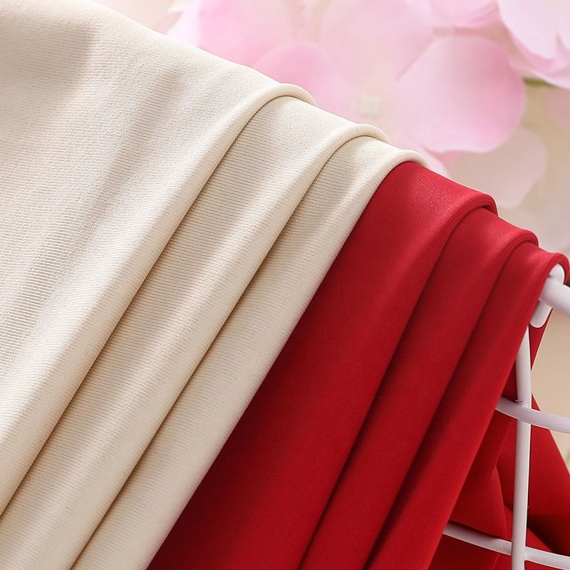 Delantex 81 Nylon 19 Spandex Weft Knit Brushed Peach Skin Interlock Fabric Free Sample