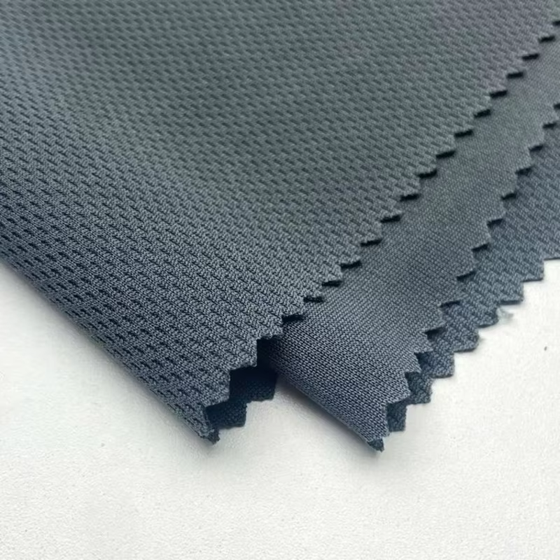 Delantex 100% Polyester DTY 140GSM Bird Eye Mesh 100% Polyester Breathable Weft Knitted Mesh Fabric for Sports Wear