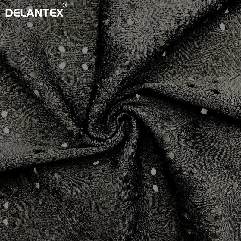 Delantex Fashion Polyester Jacquard Stretch Knit Garment Plain Dyed Hole Jacquard Dress Fabric Free Sample
