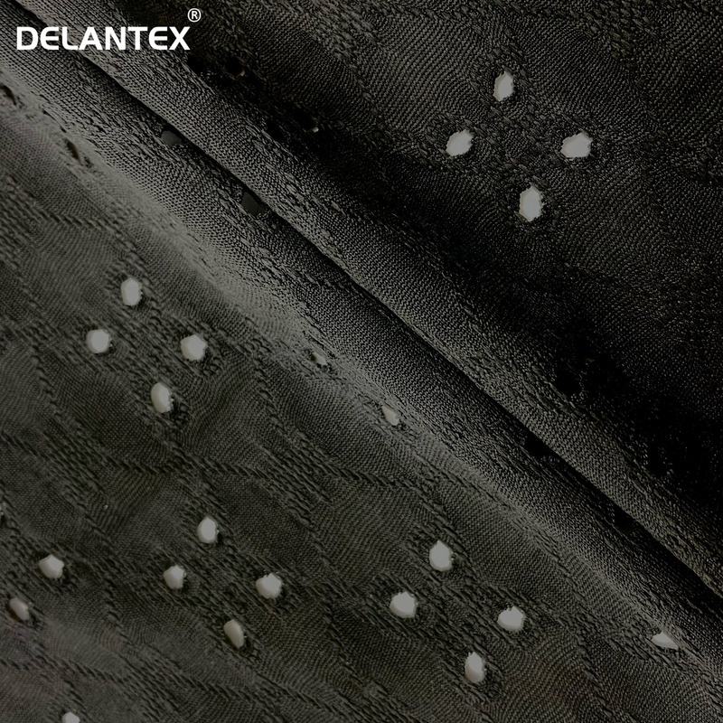 Delantex Fashion Polyester Jacquard Stretch Knit Garment Plain Dyed Hole Jacquard Dress Fabric Free Sample