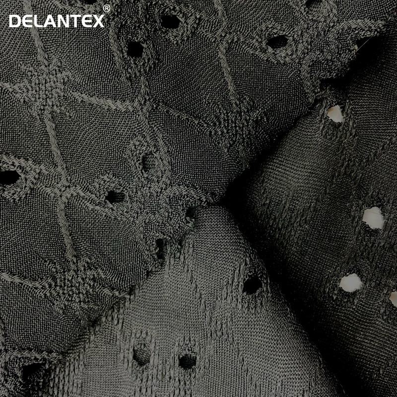 Delantex Fashion Polyester Jacquard Stretch Knit Garment Plain Dyed Hole Jacquard Dress Fabric Free Sample