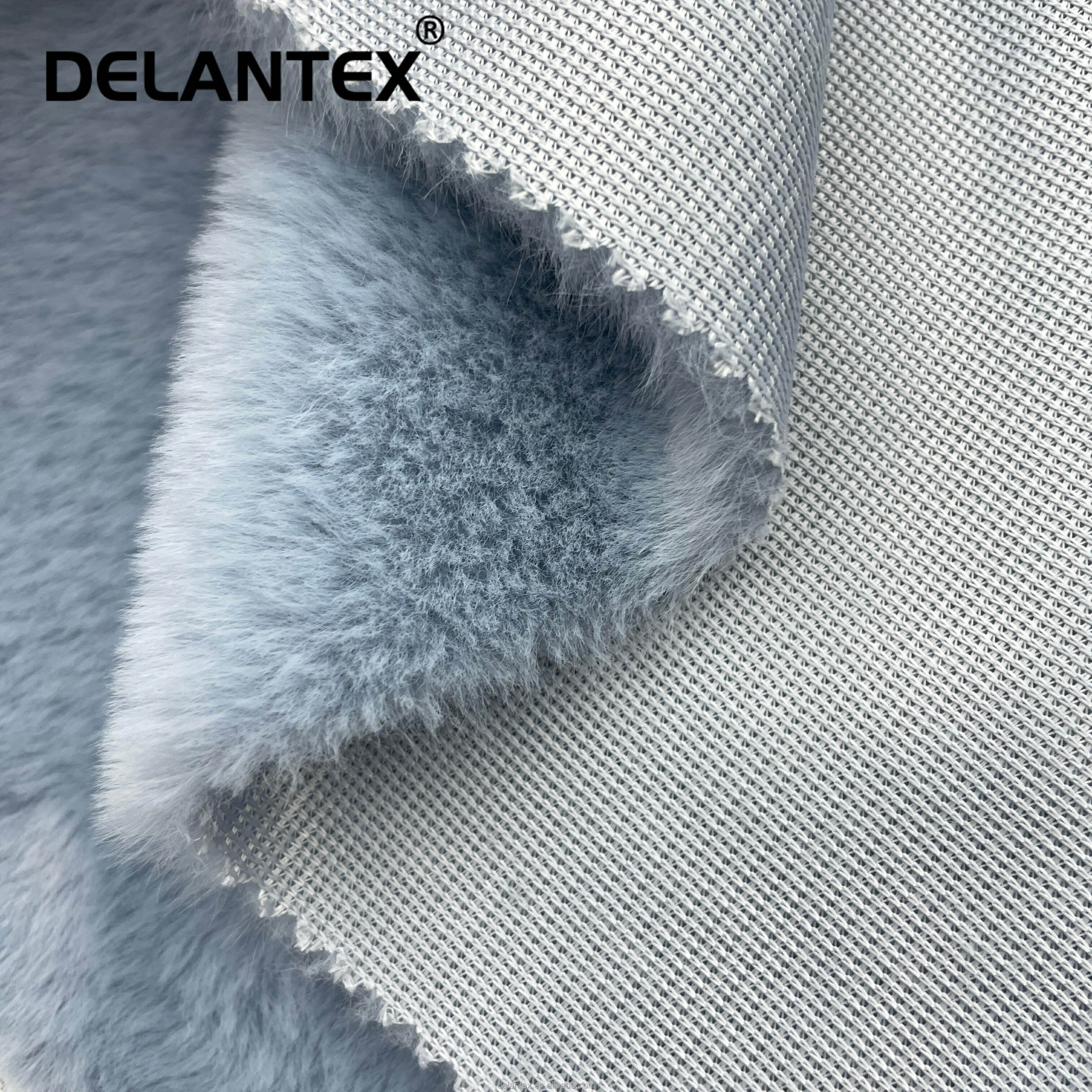 Delantex Customized Colors Soft High Quality Keeping Warm Polyester Rabbit Fur Fabric Wholesaler