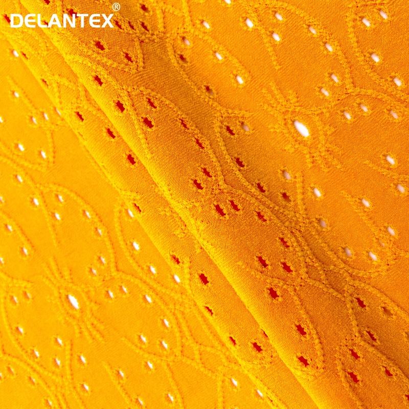 Delantex Factory Supply Hot Sale Holes Jacquard Mesh Fabric Plain Dyed for Dress