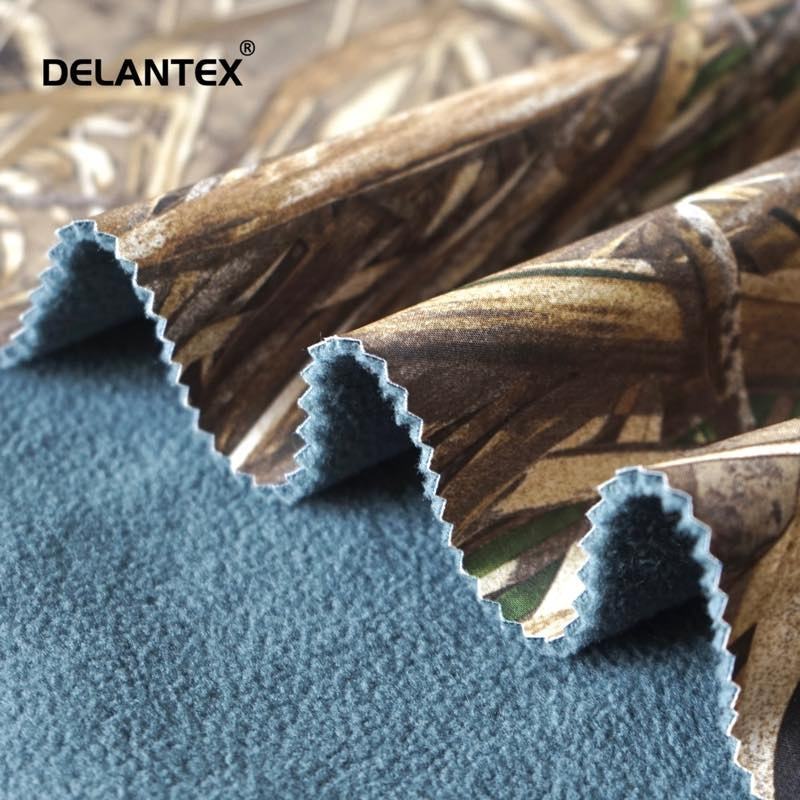 Delantex Hot Sale Sports Fleece Windproof TPU Bonded Softshell Fleece Fabric for Jacket Winter Fabrics for Clothing