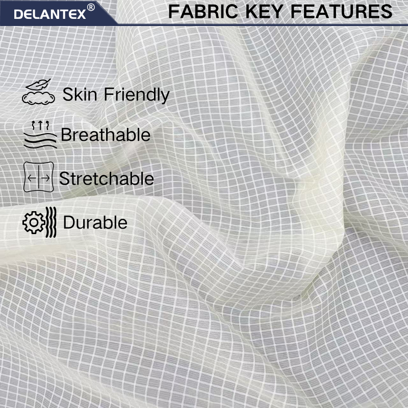 Delantex 100% Nylon 28GSM ultra Light Weight Small Grid 15D*40D Semi‑Dull Nylon Ripstop Fabric For Skin Coat Down Jacket Lining