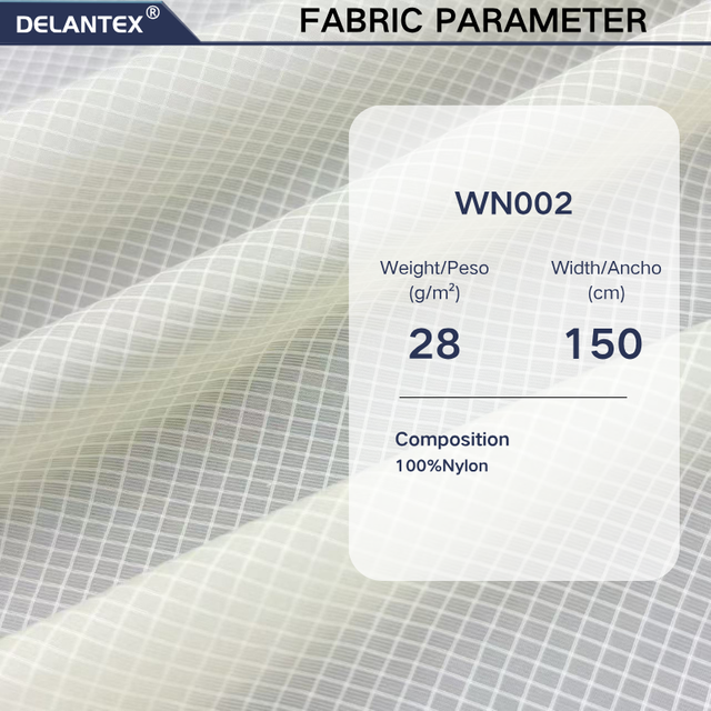 Delantex 100% Nylon 28GSM ultra Light Weight Small Grid 15D*40D Semi‑Dull Nylon Ripstop Fabric For Skin Coat Down Jacket Lining