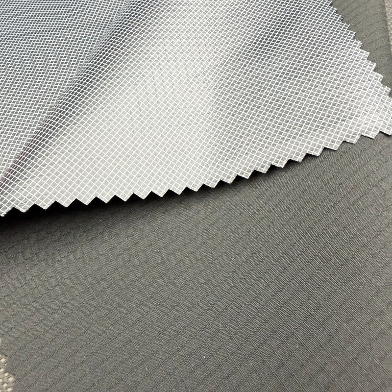 Double‑Yarn 4‑Way Stretch Fabric with Color Film Lamination Waterproof for Outdoor Clothing Fabric Flexible Textile Supplier