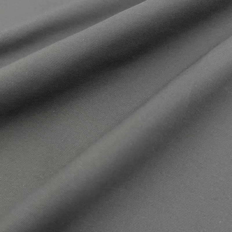 Delantex OEM ODM Waterproof Plain Dyed Woven 190gsm 100% Polyester ATY High Elastic 2/1 Twill Fabric for Outdoor Hiking Coat