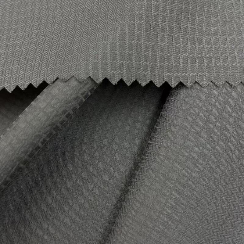 Delantex Wholesale 80GSM 100% Polyester 50d Plain Grid Jacquard Woven Fabric for Shirt Flexible Fabric Manufacturer